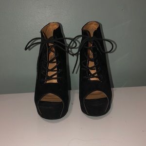 Black suede heels. About 6” heel.